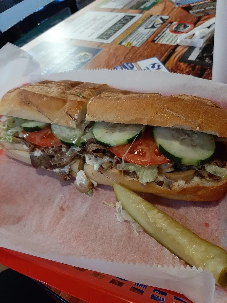 8 in Philly Cheese Steak with Lettuce Tomatoes Cucumbers and a Pickle