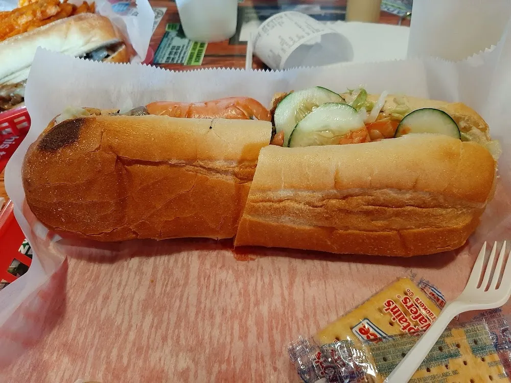 Philly Cheese Steak Sub with Lettuce Tomatoes Cucumbers and Oil and Vinger